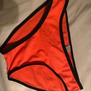 Bright orange bathing suit bottoms
